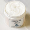 Jar of Noodle & Boo baby balm on a white background