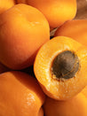 Close-up of apricots with a focus on texture and color.