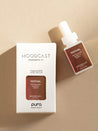 Moodcast fragrance refill bottle and packaging on a beige background