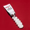Juliette Has a Gun Not A Hand Cream 30mL, available at Rafa Natural. Product on red background with cream squeezed out of the tube.