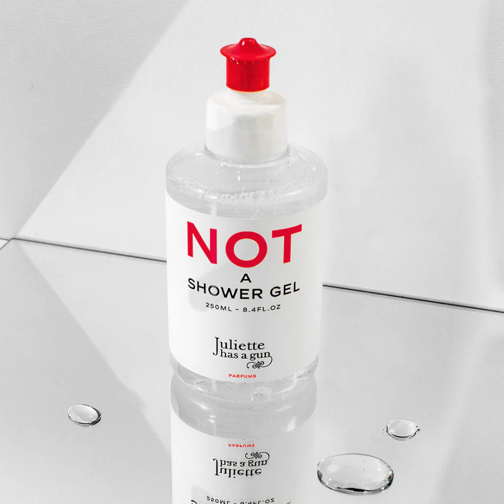 Juliette Has a Gun Not A Shower Gel 250mL with product drops.