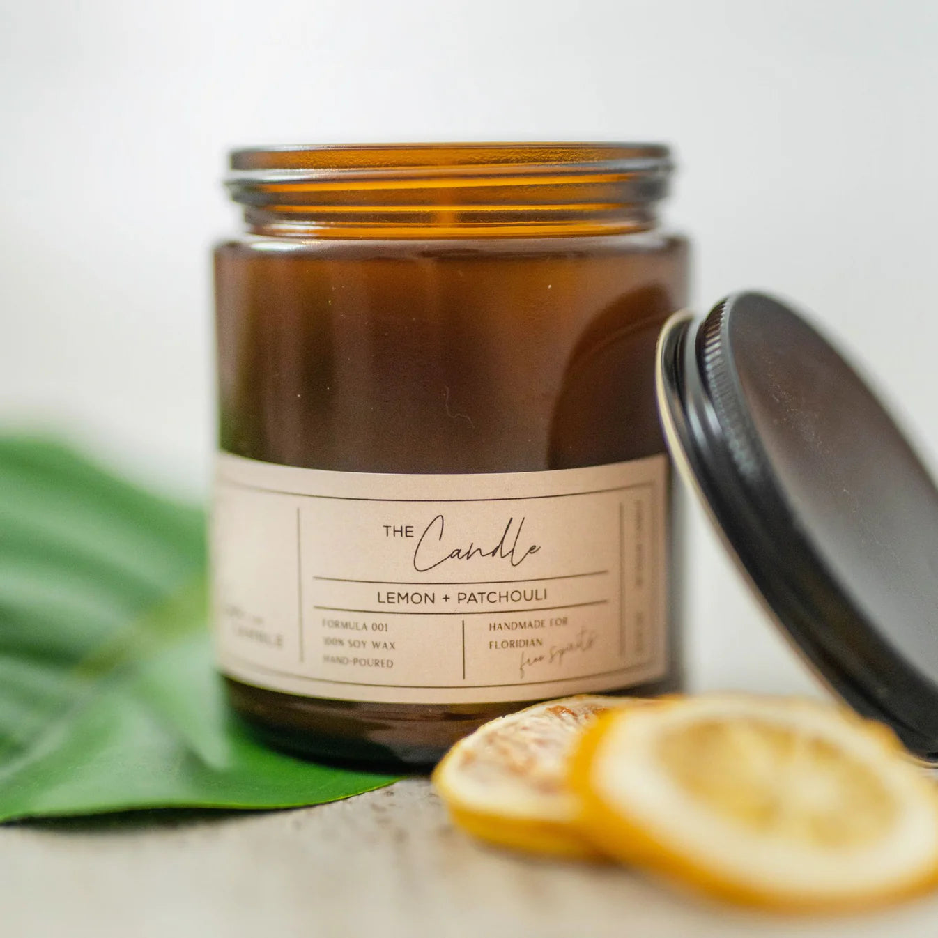 Lemon_Patchouli50HrCandle.webp