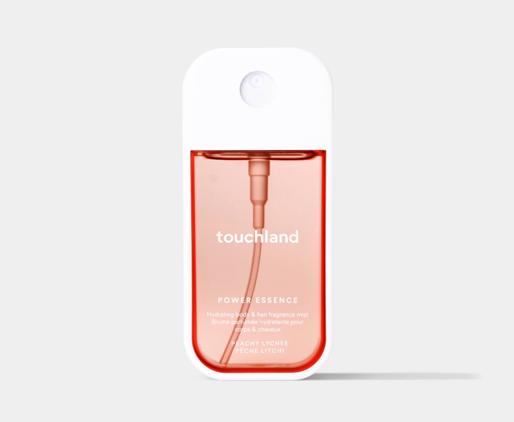 Touchland power essence bottle on a light gray background