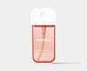 Touchland power essence bottle on a light gray background