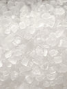 Close-up of course salt on a light gray background