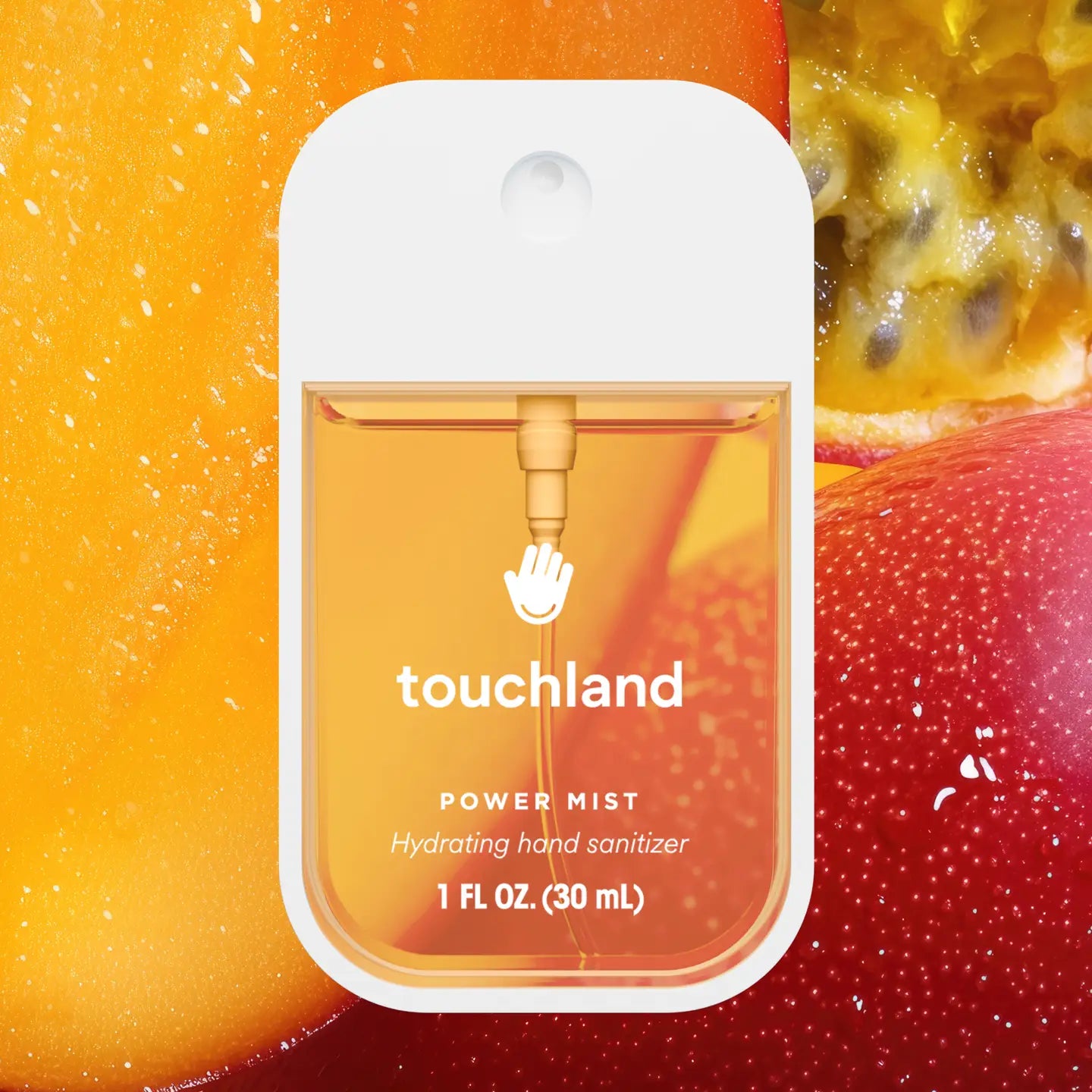 Touchland Mango Passion Power Mist, in front of mango fruits.