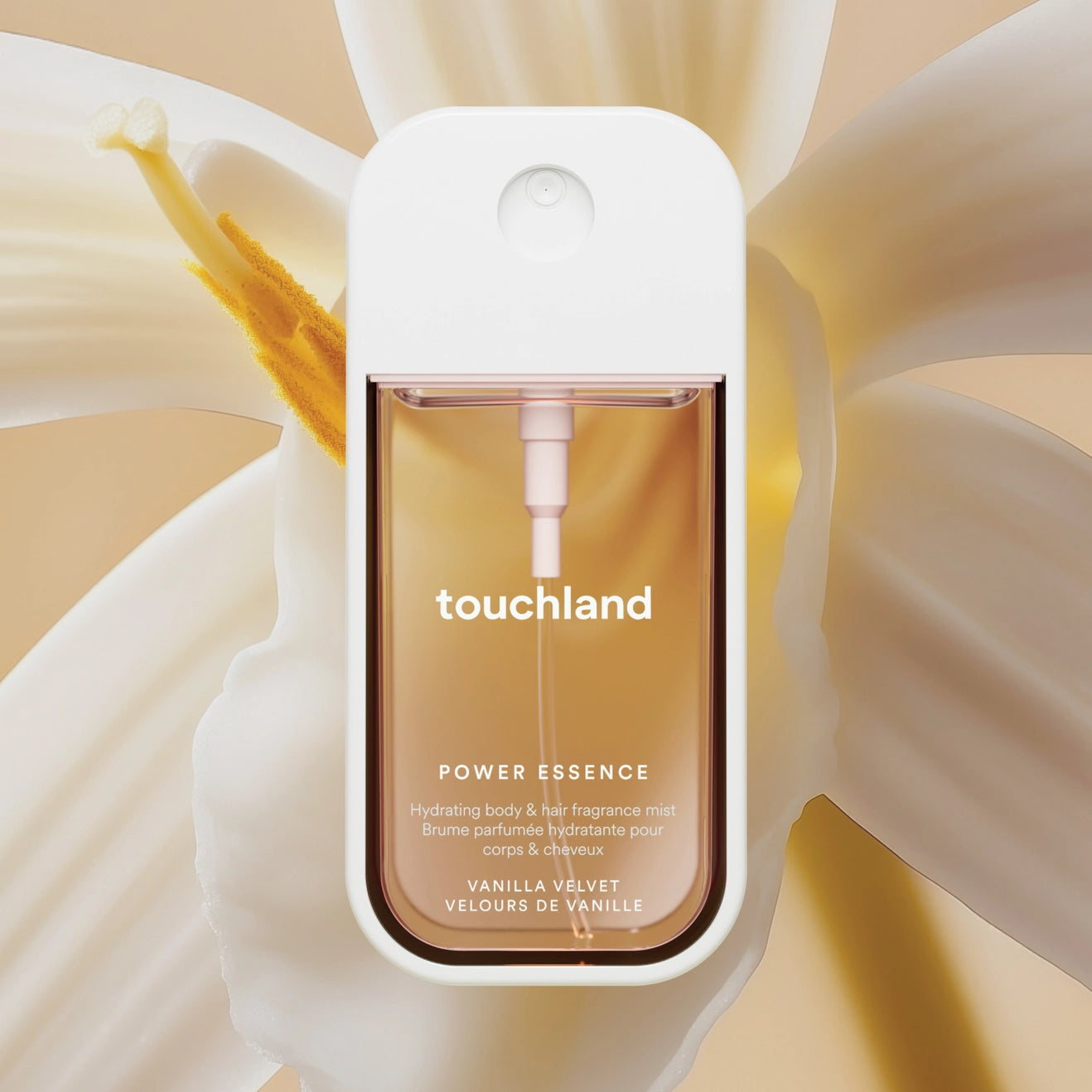 Touchland Power Essence bottle with a floral background
